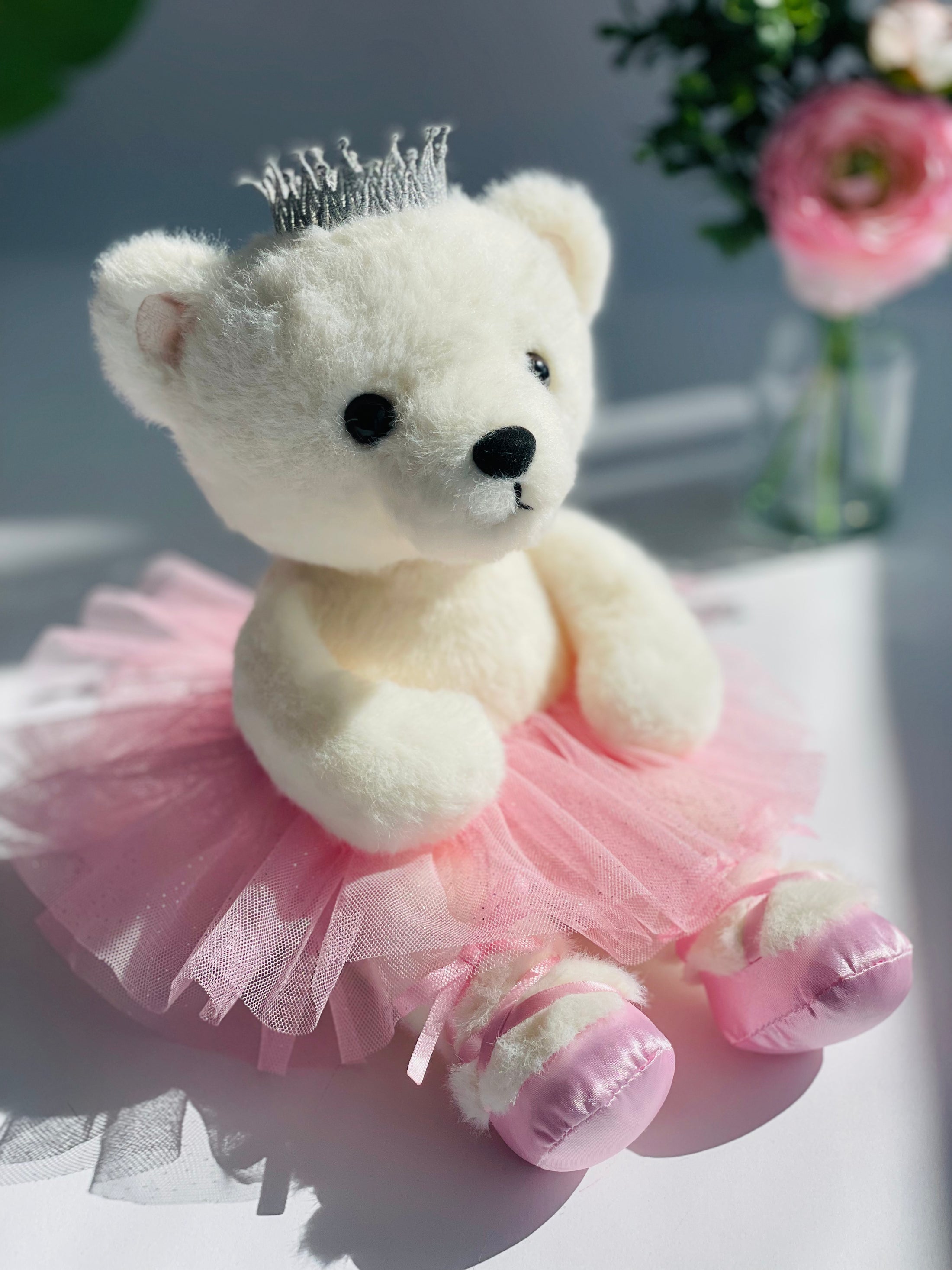 White bear ballerina with a pink tutu and a genuine rose quartz heart-shaped pendant.