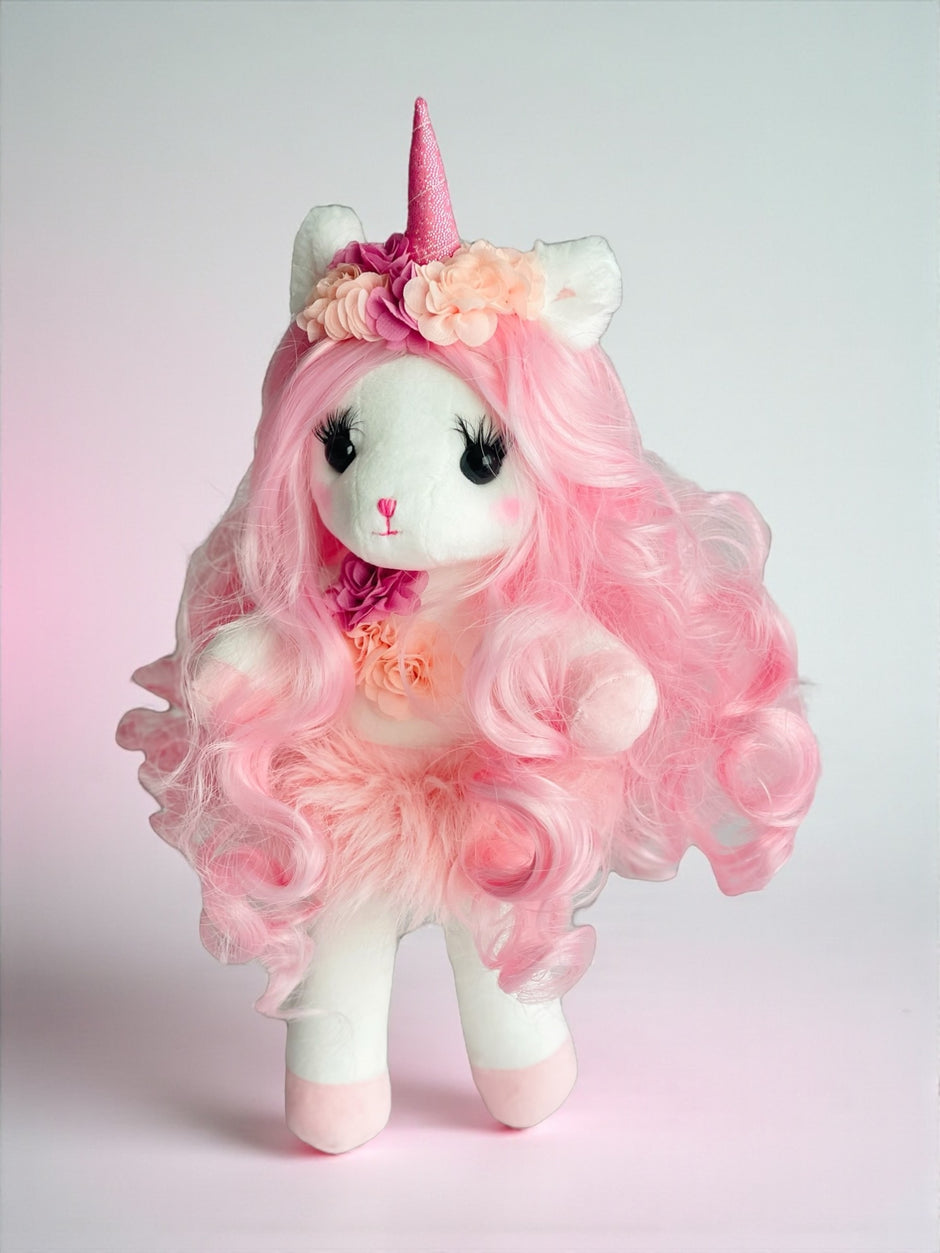 Unicorn stuffed animal with extra long hair, real eyelashes and 30 pieces hairstylist kit for hours of play-pretend